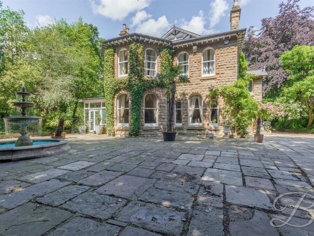 Before we step inside the £765,000-plus house, here is a close-up of its grand, imposing exterior, as viewed from the carriage driveway that leads up to the front door and also provides plenty of off-street parking space. Note also the charming water feature.