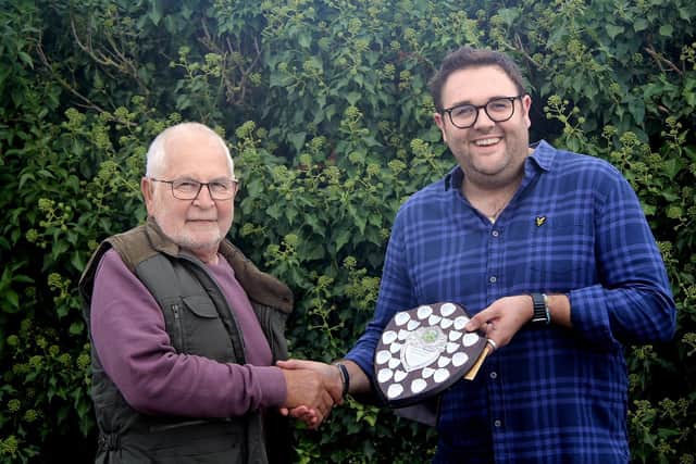 John Keating (left) was presented his trophy for 'Best Allotment' by Zach Towers.