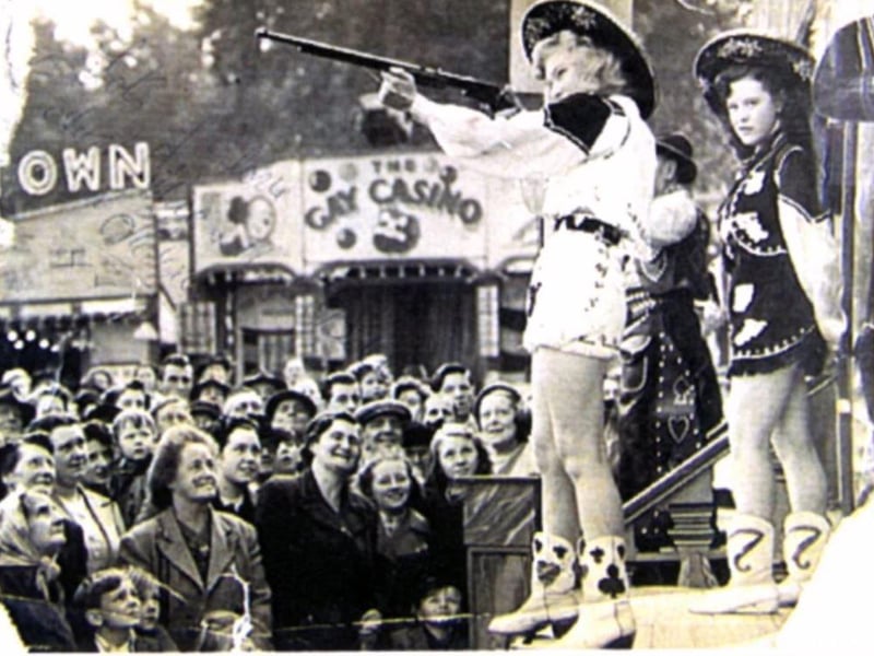 Wild west girl Florence Shufflebottom entertains the crowd at the fair in 1956