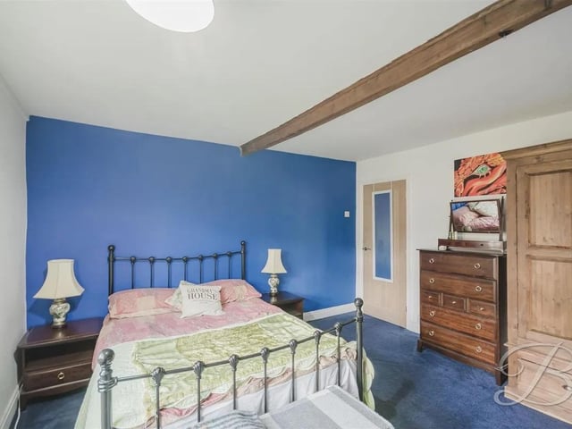 The property has four spacious bedrooms in the main house.