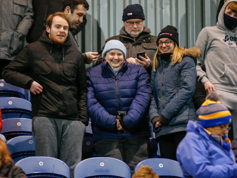Mansfield Town's faces in the crowd against Swindon Town.