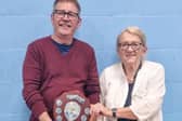 Michael Chisolm, with organiser, Karen Sutton,receiving the Gordon Jarret Shield. Photo: Lesley Grand-Scrutton