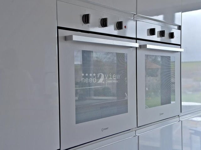 A close-up of the double oven within the modern kitchen at the £575,000 Jacksdale property.