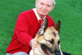 German shepard named Bon Jovi with his owner Richard Stephenson from Kirk Sandall, 1998.