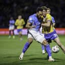 Stockport County are still waiting to confirm their play-off place following last night's defeat to Mansfield Town.
