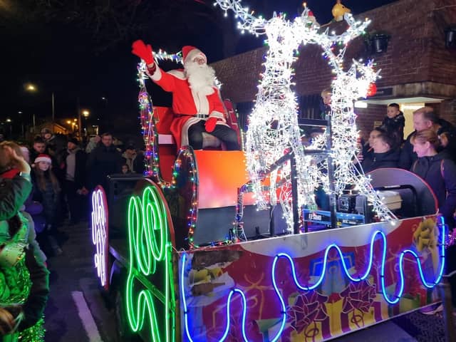 Santa arrives on his sleigh to start the festive fun