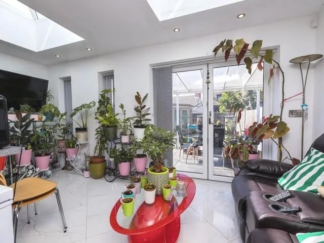 These bi-folding doors lead to the rear garden from the living area of the open-plan space on the ground floor.