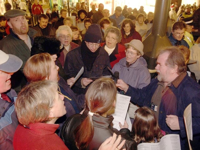 Carol singers at Kirkby's Lights switch-on event