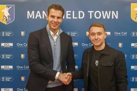 Stags CEO David Sharpe welcomes new signing Louis Reed.