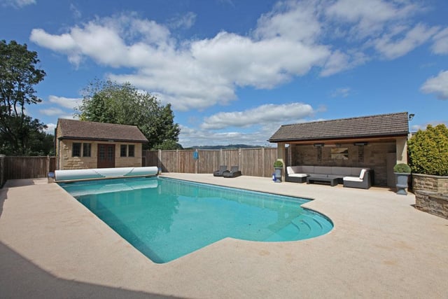 "Lovely secluded" outdoor swimming pool with covered gazebo sitting area and pool house/changing room with shower and hand basin and built-in kitchen unit with wine fridge and sink unit.