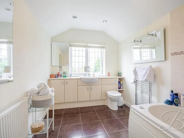 The bathroom is complete with a three piece suite including a bath, low flush WC and a hand wash basin. With a window to the rear elevation.