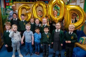 Staff and pupils at Peafield Lane Academy celebrate their good Ofsted rating.