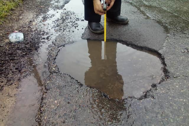 Bolsover District Cllr Donna Hales And Derbyshire County Cllr Kevin Harper Have Identified And Submitted Images Of Pothole Problems On Woodhouse Lane, Bolsover.
