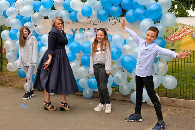 Head teacher Anne Ingle with pupils Jaylea Bettison, Abbie Bradford and Luke Bettles. Photos: Louise Brimble