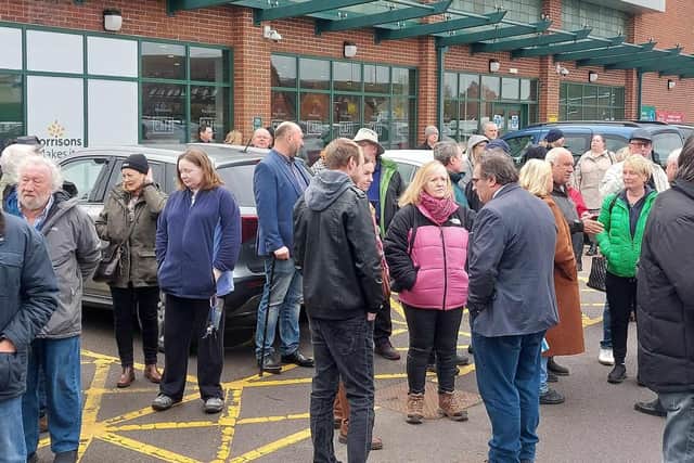Reform UK supporters gathering at the tour starting point in Kirkby. Photo: National World