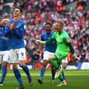 Oli Hawkins celebrates after scoring the winning penalty in the Checkatrade Trophy Final for Portsmouth against Sunderland at Wembley Stadium in March 2019.