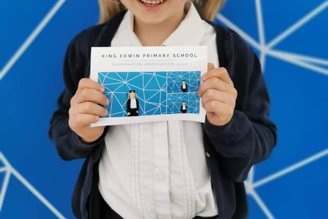 Poppy Davison also collected her graduation certificate and snapped a picture in the photo booth.
