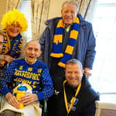 Keith Painter with Michal Kasinowicz and Gary Shaw from Mansfield Town Community Trust, and fellow Mansfield Town supporters Geff Street and Arthur Spencer.