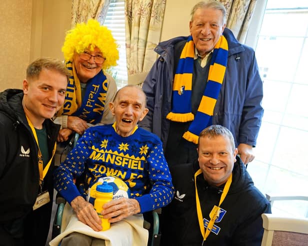 Keith Painter with Michal Kasinowicz and Gary Shaw from Mansfield Town Community Trust, and fellow Mansfield Town supporters Geff Street and Arthur Spencer.