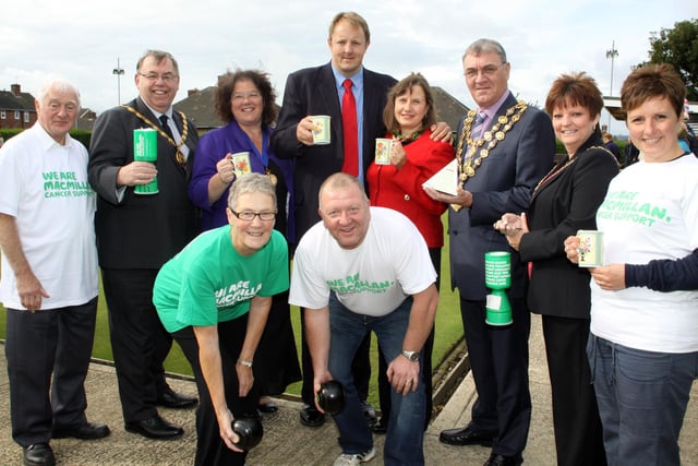 Macmillan Coffee Morning at Brimington Bowling Club in 2012. Joe Hancock, councillors George and Jean Wharmby, Chairman of DCC and consort, Toby Perkins and Susie Perkins, Donald and Diane Parsons, Mayor and Mayoress of Chesterfield and Joanne Heaton. Fl-r: Pam Wright and Paul Heaton from the club