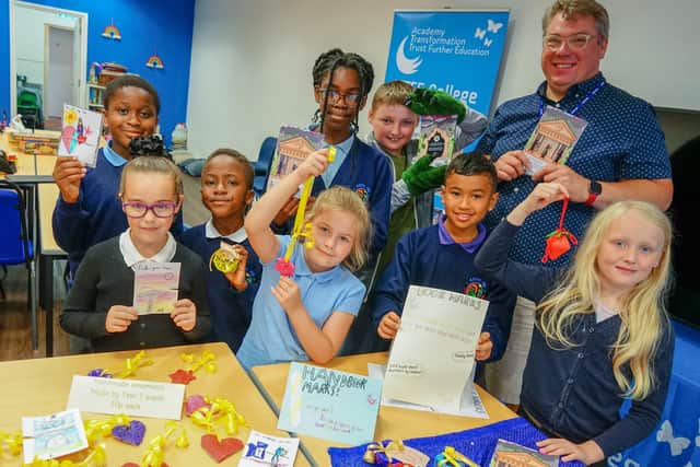Young children from Abbey Hill Primary School sell their products, made during the school's enterprise week, at a shop in Idlewells Shopping Centre. (Photo by: Brian Eyre/nationalworld.com)