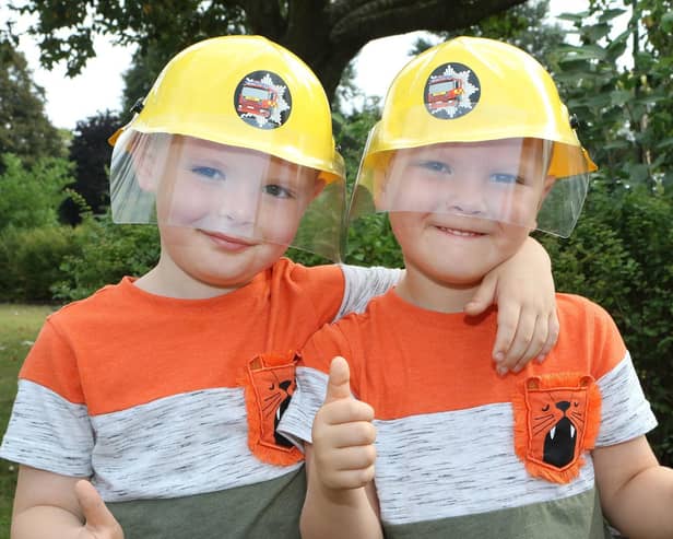 Shirebrook Fire Station open day, Jaxson and Toby Cullington in their new helmets
