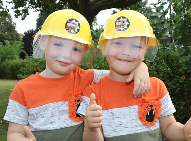 Shirebrook Fire Station open day, Jaxson and Toby Cullington in their new helmets