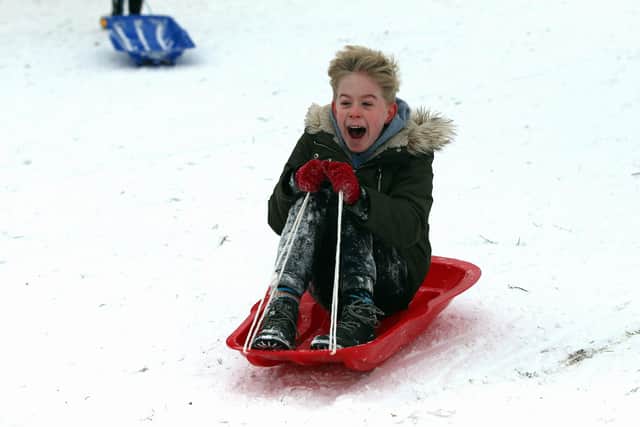 Henry Westwell, 9, from Forest Town, has fun sledging after snow forced the closure of the local schools in the Mansfield area. Picture by Dan Westwell.