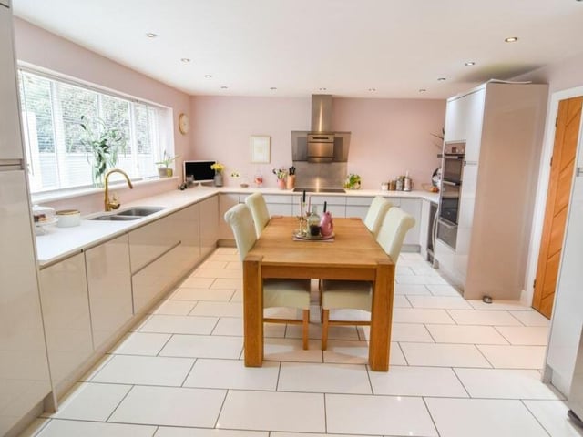 The fitted kitchen/diner is full of style, as well as overflowing with space. A range of contemporary units offers lots of storage space.