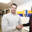 Stags CEO David Sharpe welcomes Lucas Akins to Mansfield Town.