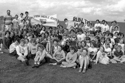 Bull Farm schoolchildren enjoy a day out in 1986. Bull Farm Middle School closed in 2001, and Bull Farm First School and Nursery also closed down. The educational needs of the area are now served by other institutions, and new developments are taking place on the site.