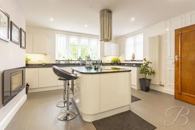 A range of integrated appliances in the kitchen include an oven, microwave and dishwasher, while there is also a wine cooler and inset sink with a mixer tap above. You will easily find space for a large fridge/freezer too.