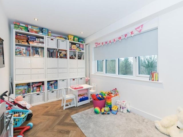 Completing the first floor is this useful playroom. It could be turned into a family room if required.