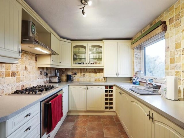 Let's move into the property's annexe, which can be found on the lower ground floor. It is fully equipped and features a fitted kitchen with sink and drainer, extractor fan, gas hob, electric oven and integrated fridge and freezer.
