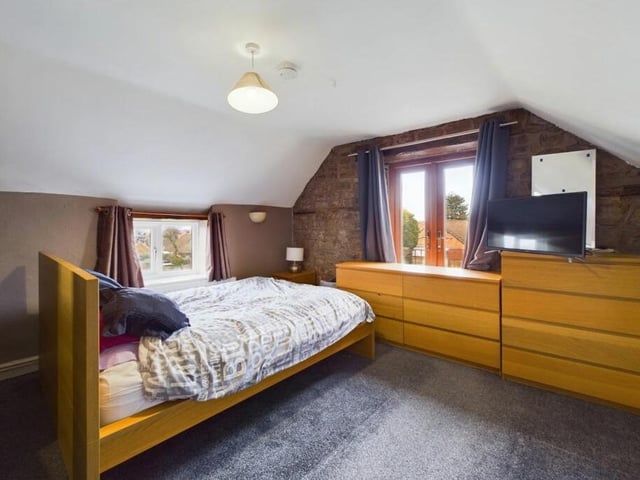 All five bedrooms on the first floor of the £700,000 Kirkby farmhouse are generously sized, while the master has access to a private balcony.