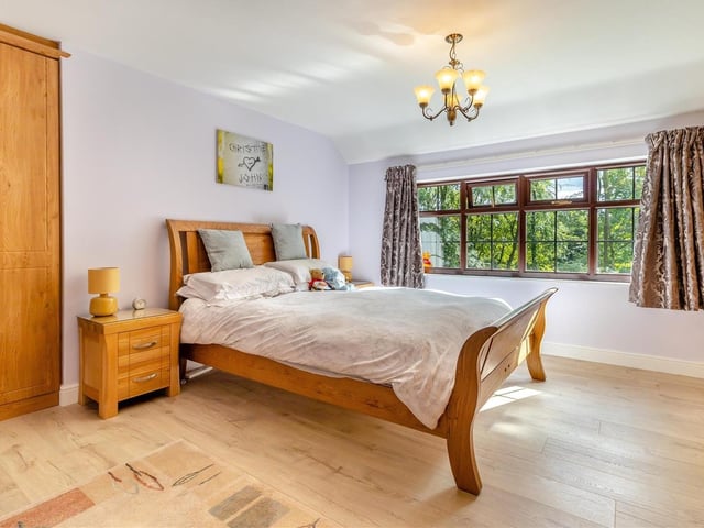 The first bedroom to have a glance at is the master, which has an oak laminate floor and a double-glazed window that faces the front of the property.
