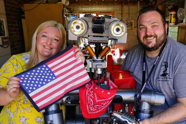 Ryan and Stacy Howard are off to Texas with their Johnny 5 model from Short Circuit