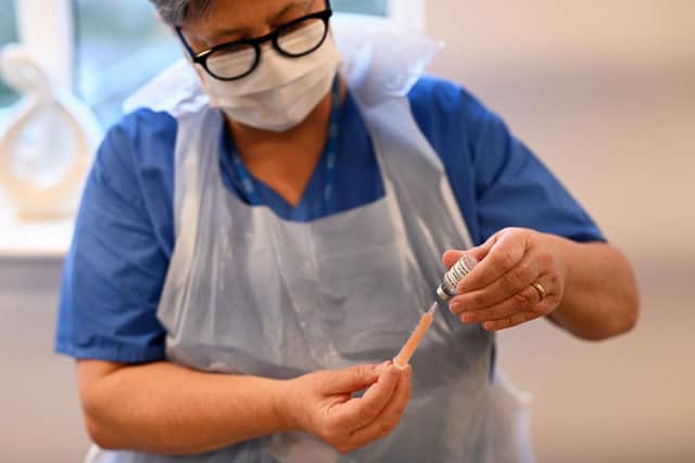 More than 140,000 people in Nottingham and Nottinghamshire have booked appointments to top up their immunity with a Covid-19 Autumn Booster jab (Photo by Oli SCARFF / AFP) (Photo by OLI SCARFF/AFP via Getty Images)