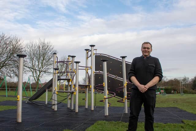 Coun Daniel Williamson with the new play equipment at Titchfield Park in Kirkby