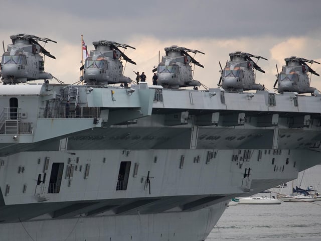 Merlin helicopters on the flight deck of the Royal Navy aircraft carrier HMS Queen Elizabeth. Picture: Andrew Matthews/PA Wire