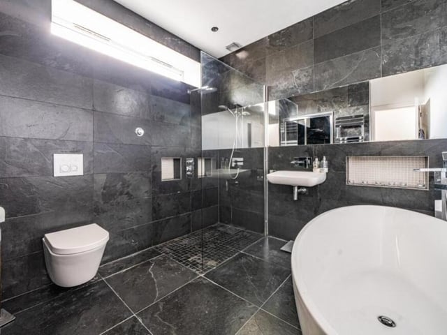 One if the highlights of the first floor is this luxurious four-piece bathroom suite, adorned with modern features.