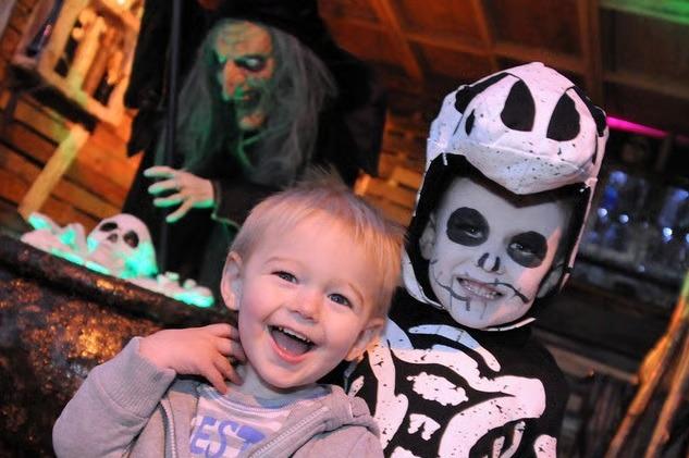 Riley, four, and his 18-month-old brother, Cody show no sign of fear at their Halloween spectacular on Vale Road, which was created by their dad Lee and sister Jaidie-Leigh, 11