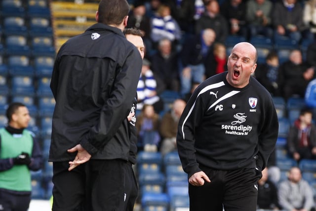 Spireites boss Paul Cook vents his anger at the fourth official during a game against Wycombe Wanderers.