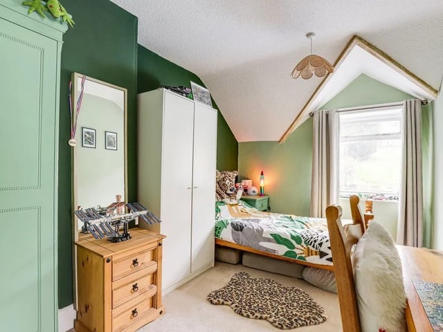 One of the spacious bedrooms, ample space for a family or for hosting guests.