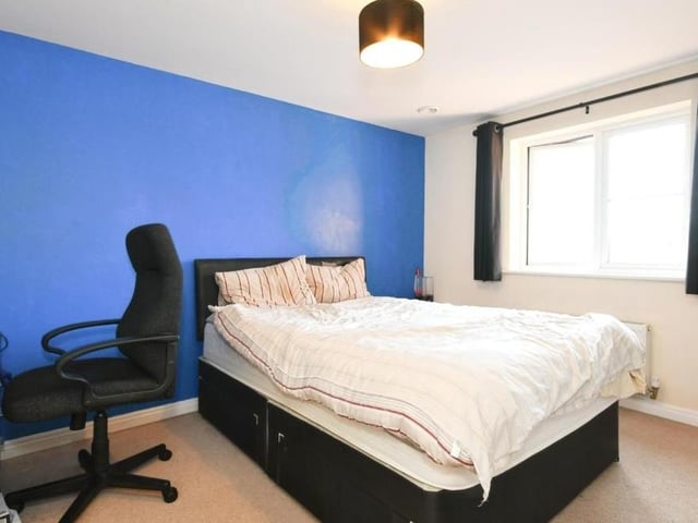 The other three bedrooms are all a good size, including this one, which faces the front of the Sutton property. There is even room for a desk and chair.
