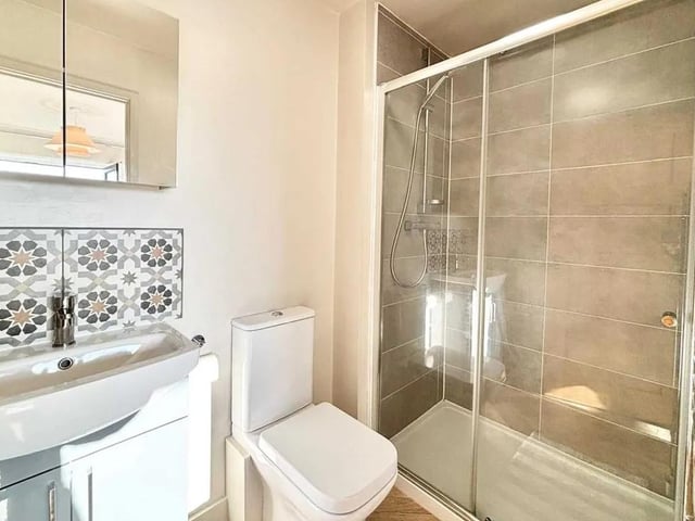 The property features a stunning two stylish and modern en suite bathrooms.