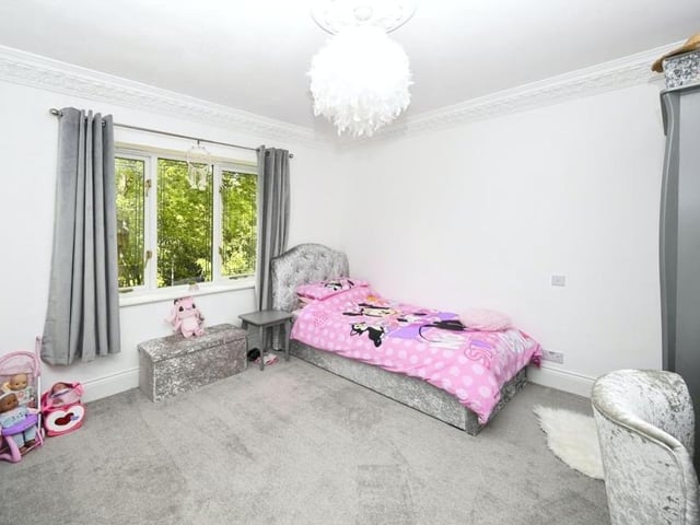 A smaller bedroom, but cute and ideal for a child.