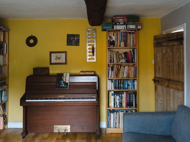Our first look at the formal sitting room at the front of the £575,000 house. It is a characterful space where hardwood floorboards run underfoot.