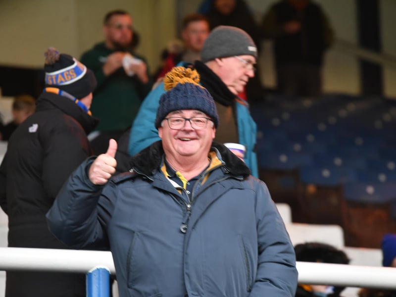 Mansfield Town fans watch the brilliant win at Peterborough United.