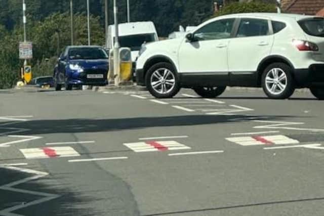 Red crosses on the zebra crossing on Mickledale Lane. Photo: Submitted
